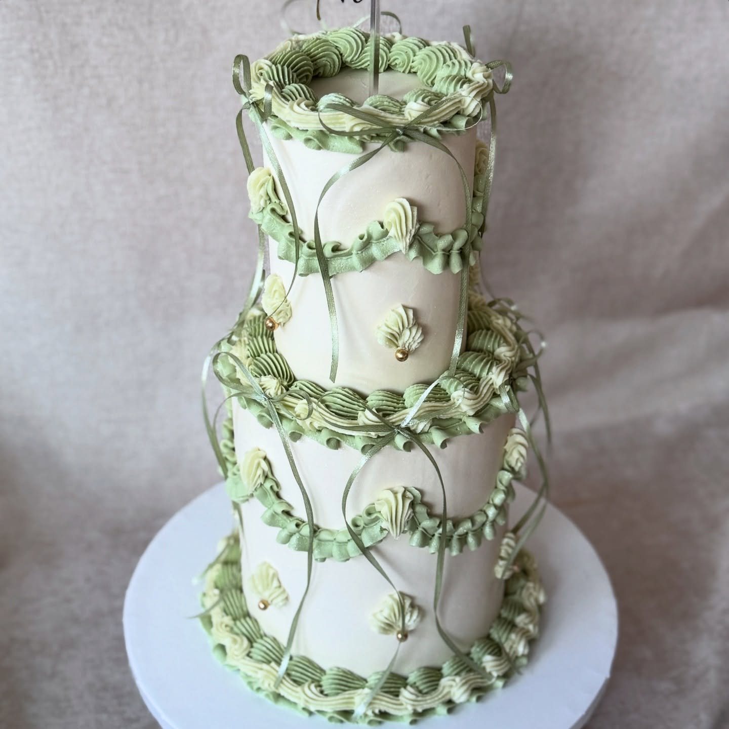 Sage green three tier vintage cake